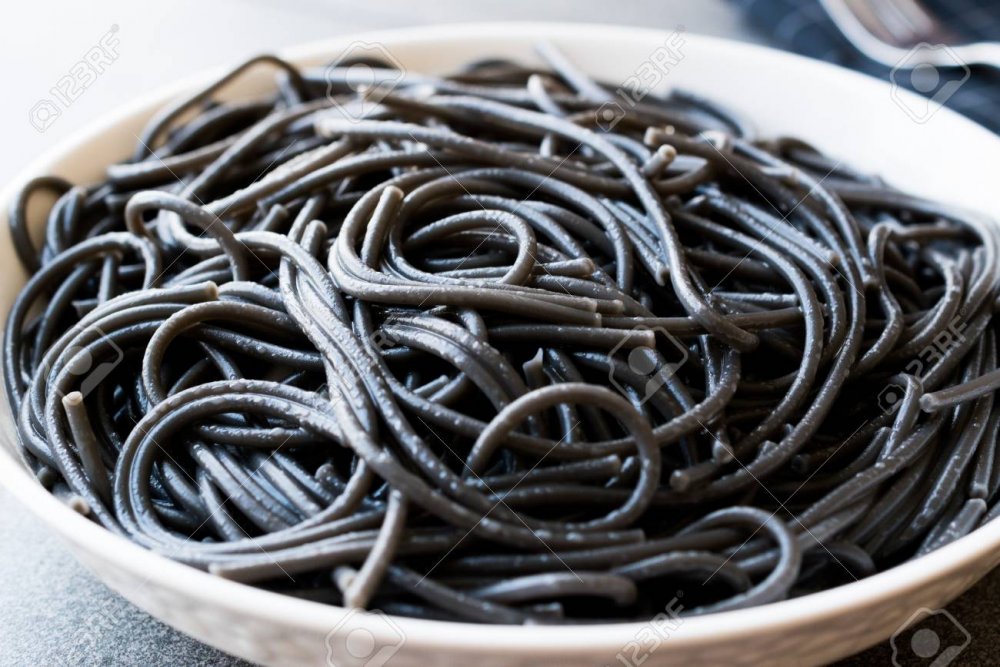 103248740-black-spaghetti-pasta-flavored-with-squid-ink-cuttlefish-or-inkfish-organic-food-.jpg