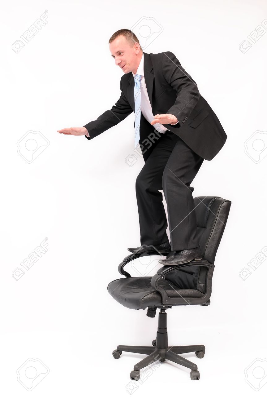 Image result for standing on a chair at work