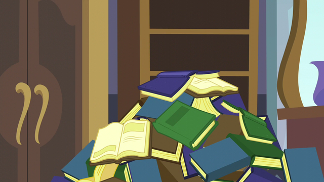 640px-Pile_of_books_falls_on_top_of_Spike_S5E10.png