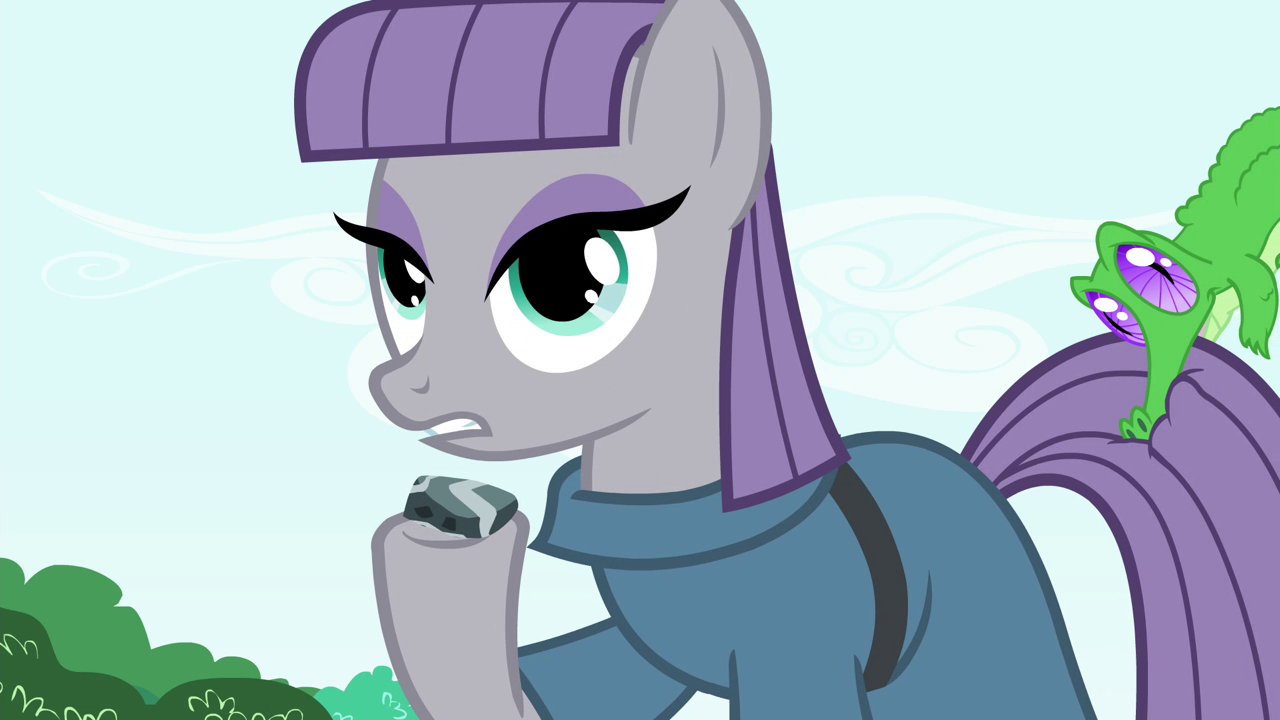 Maud_holding_sedimentary_rock_S4E18.png