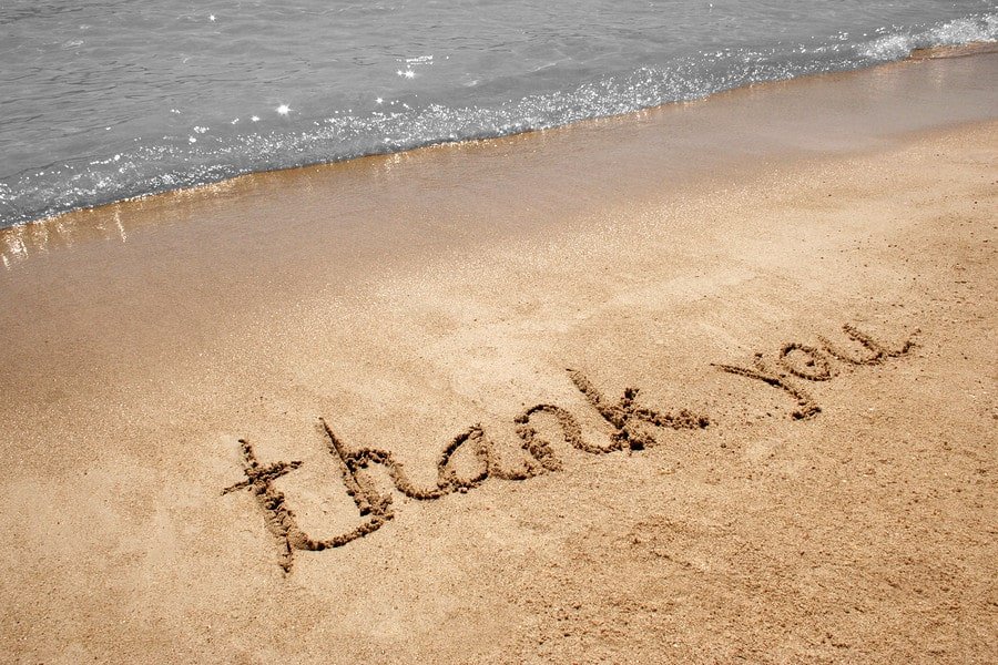 bigstock-Thank-you-handwritten-in-sand-1