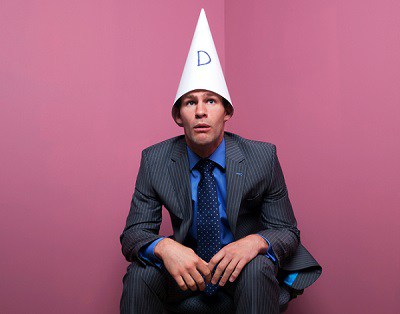 dumb-guy-wearing-dunce-cap.jpg