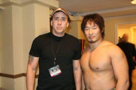 Too left field to not share, Nick Cage and Marufuji Naomachi take a photo.