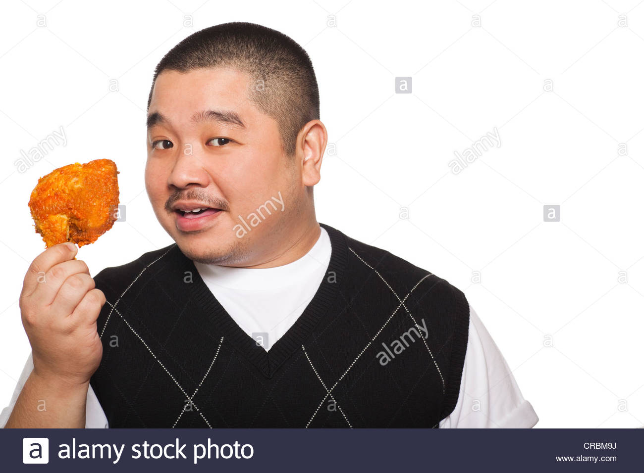portrait-of-a-hungry-man-holding-fried-c