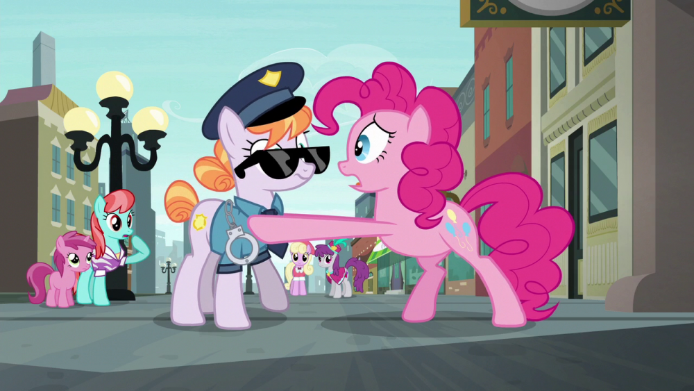 Pinkie_Pie_shaking_the_police_officer_S6E3.png