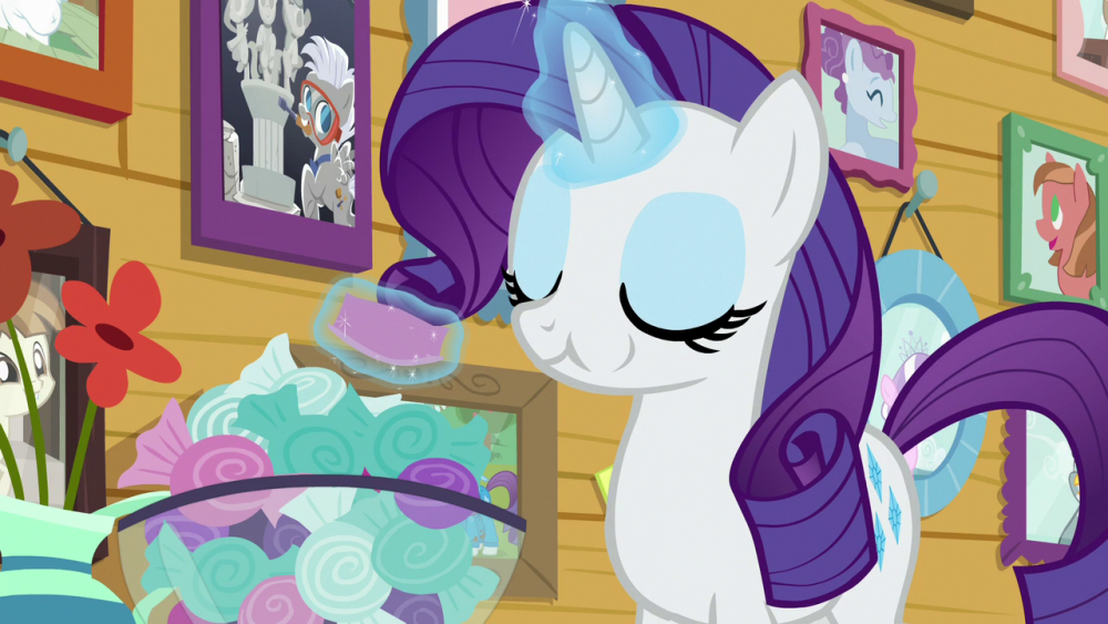 Rarity eating candy.png