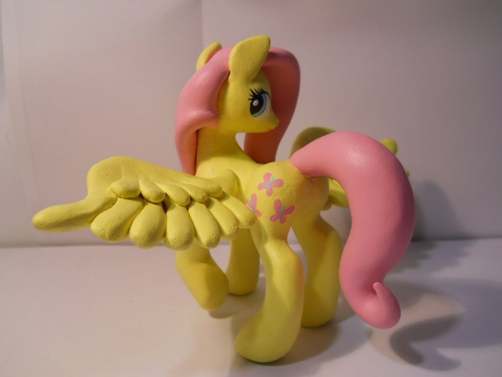 fluttershy_by_hoikarnage-d6hg1ga.thumb.jpg.8022e9a700054c58410d9c152c98e724.jpg